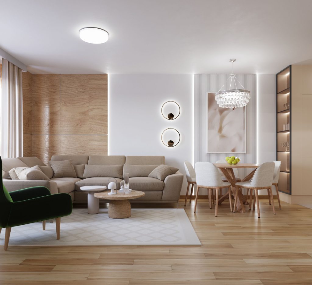 Dizajn enterijera dnevne sobe i trpezarije sa ugaonom sofom, drvenim zidnim panelima i kristalnim lusterom